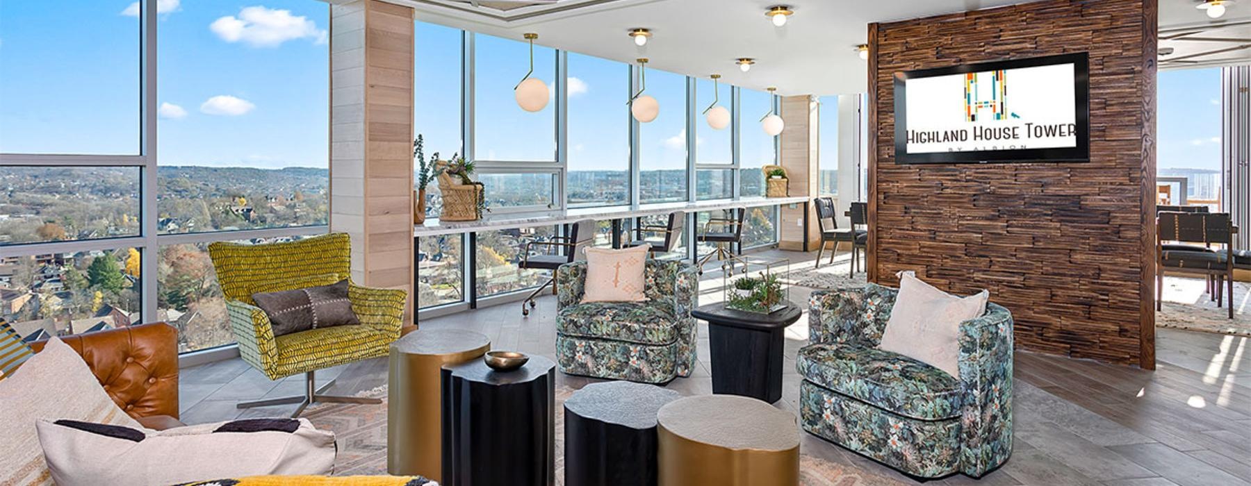 a modern lounge room with leather seating
