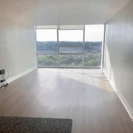 a spacious room on wooden floors