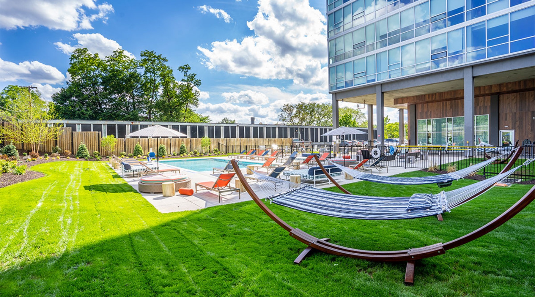 outside green turf area with hammocks outside green turf area with hammocks